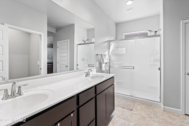 full bath with a sink, visible vents, double vanity, and a shower stall