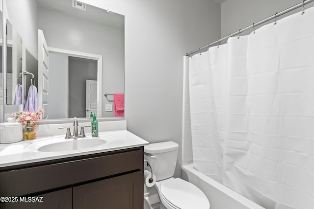 full bathroom featuring visible vents, toilet, shower / bath combo, and vanity