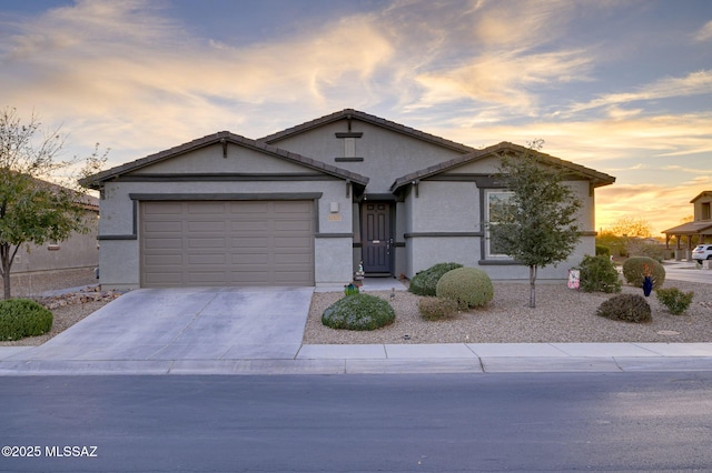 ranch-style house featuring a garage