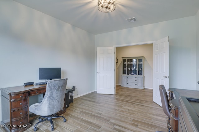 office area with light wood-type flooring