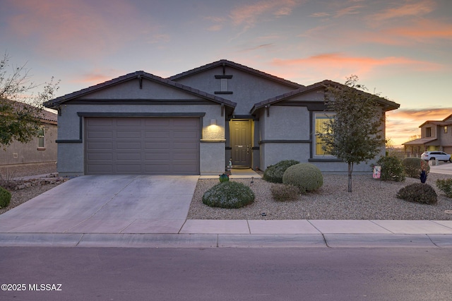 view of front of property with a garage