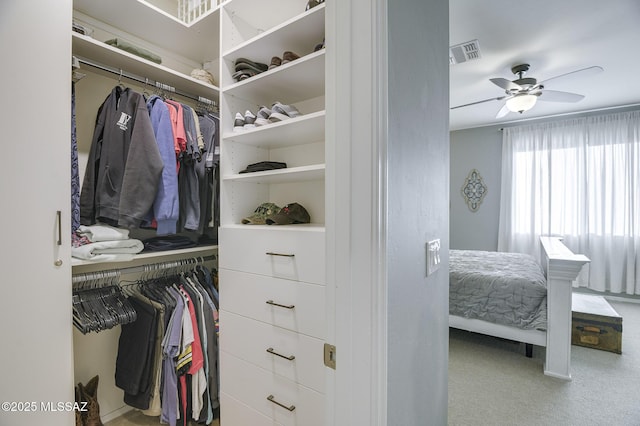 spacious closet featuring ceiling fan