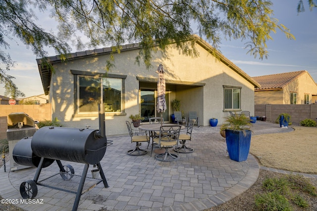 back of house featuring a patio area