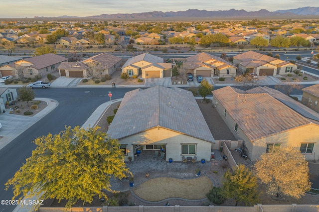 aerial view at dusk with a mountain view