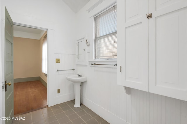 bathroom featuring tile patterned flooring and sink