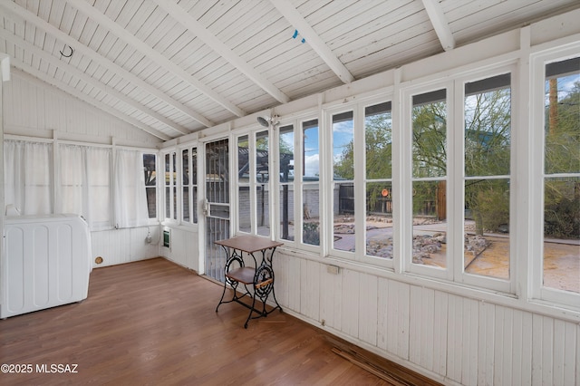 unfurnished sunroom with wood ceiling and lofted ceiling with beams