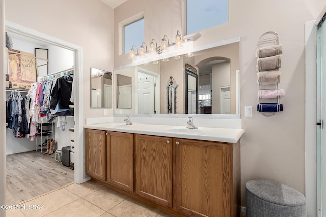 bathroom featuring vanity and tile patterned flooring