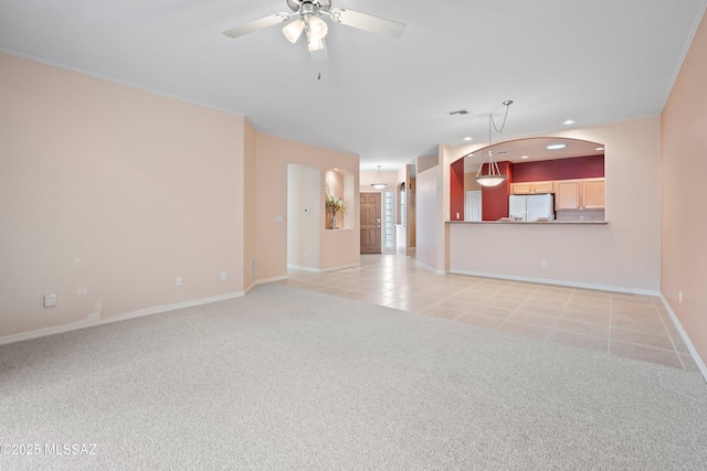 unfurnished living room with light carpet, baseboards, ceiling fan, light tile patterned flooring, and recessed lighting