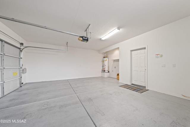 garage featuring gas water heater and a garage door opener