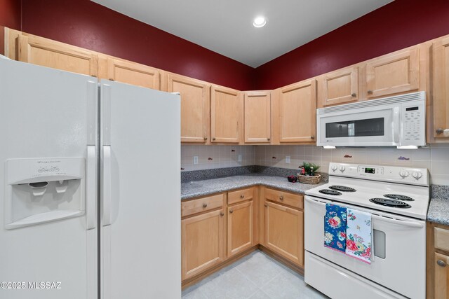 kitchen featuring light tile patterned floors, light brown cabinets, white appliances, light countertops, and backsplash