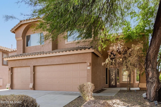 view of front of home with a garage