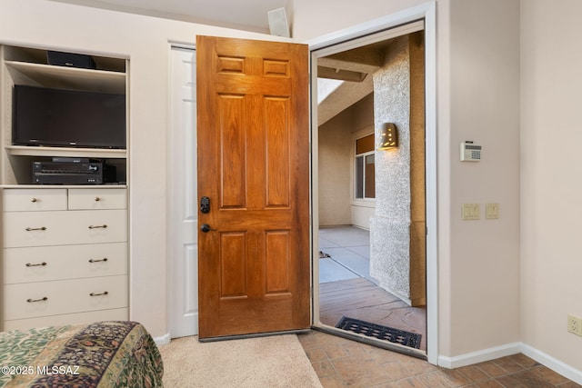 bedroom with baseboards