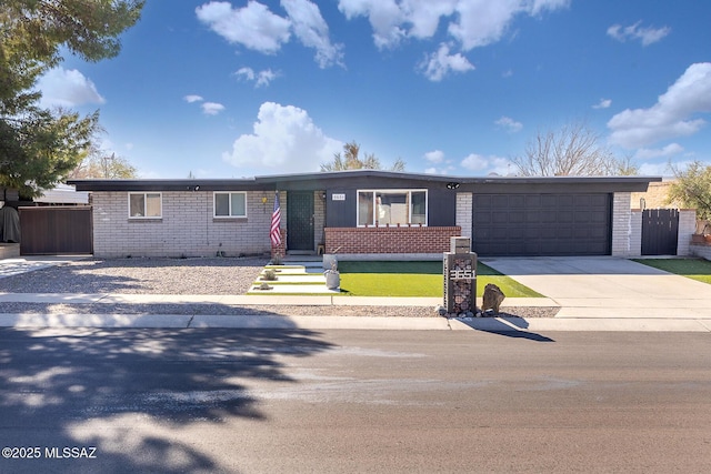 ranch-style house featuring a garage