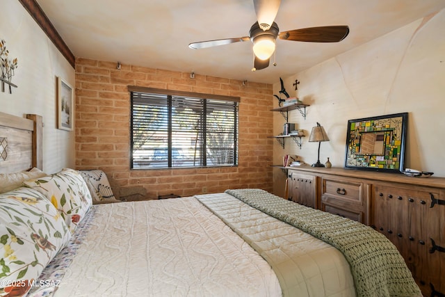 bedroom with brick wall