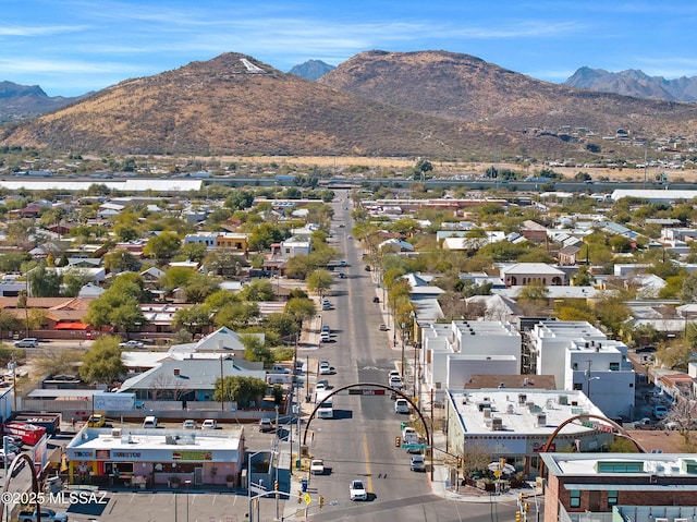 birds eye view of property featuring a mountain view