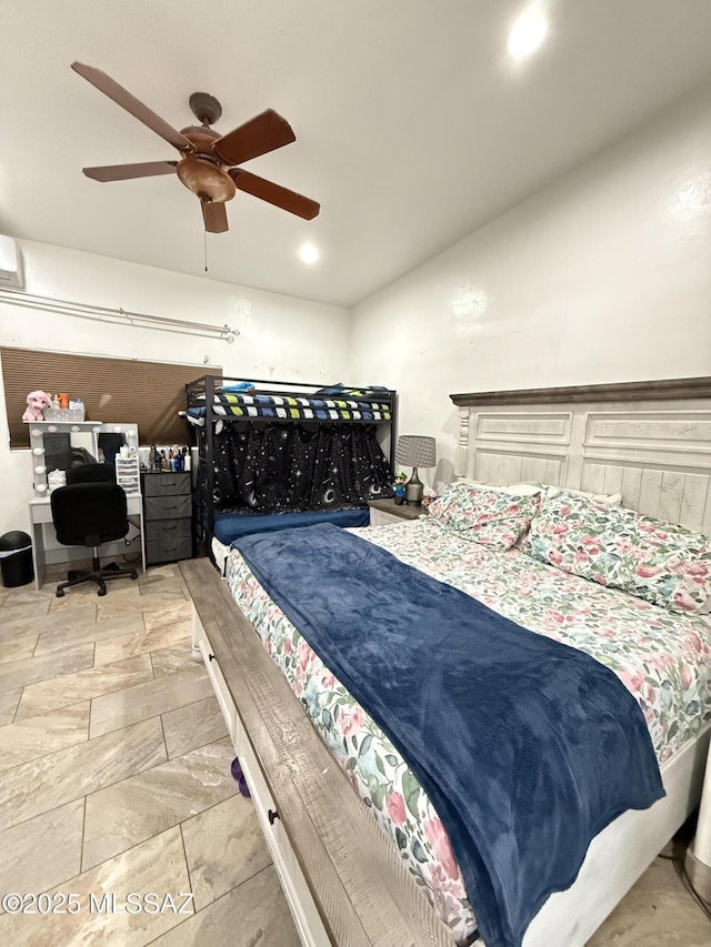 bedroom featuring vaulted ceiling and ceiling fan