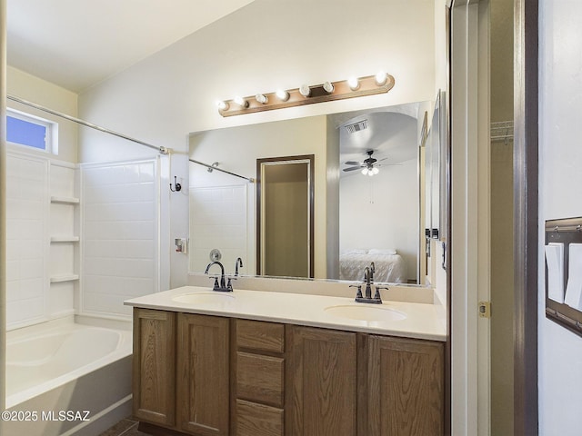 bathroom featuring vanity, shower / washtub combination, and ceiling fan