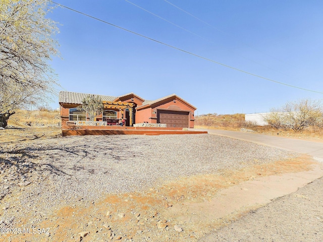 view of front of property featuring a garage