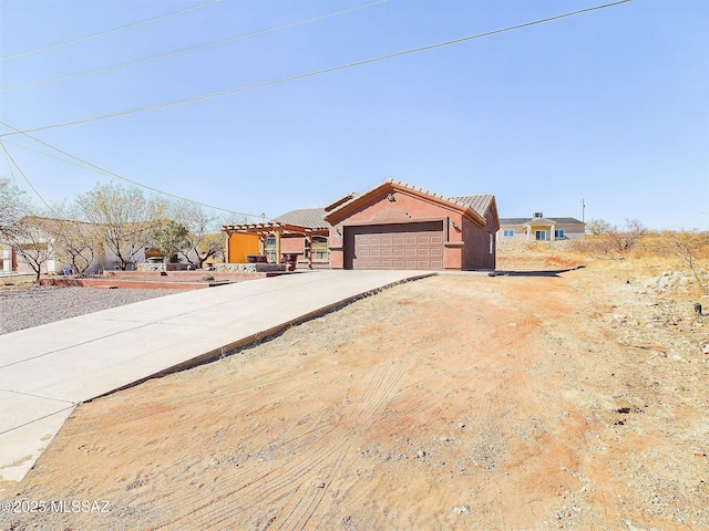 view of front of home with a garage