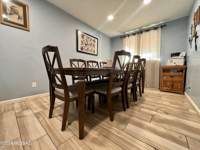 dining room with light hardwood / wood-style flooring