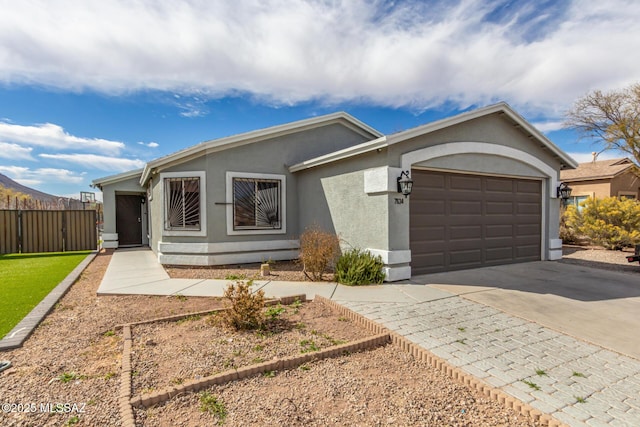 ranch-style home with a garage