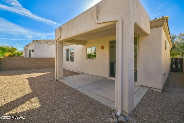 rear view of property with a patio area