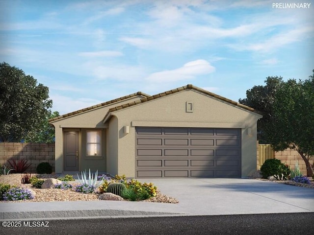 view of front of home with a garage