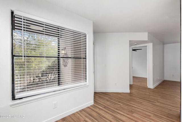 unfurnished room featuring wood-type flooring