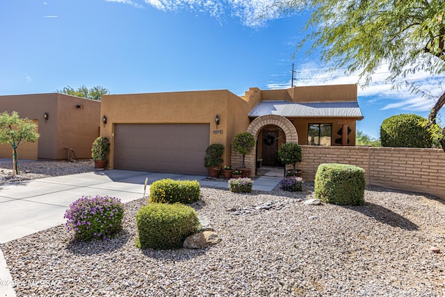 adobe home with a garage