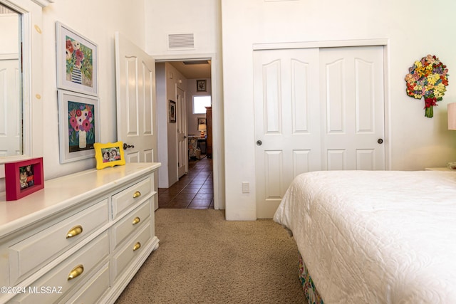 bedroom with a closet and carpet