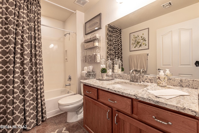 full bathroom featuring shower / bathtub combination with curtain, tile patterned floors, toilet, and vanity