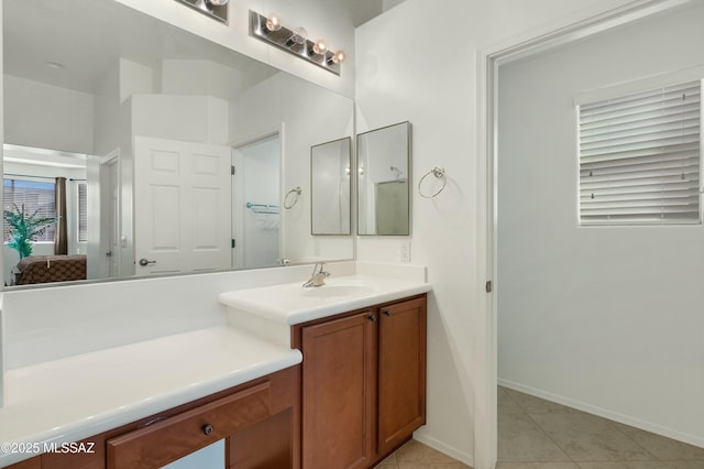 bathroom with vanity and tile patterned floors