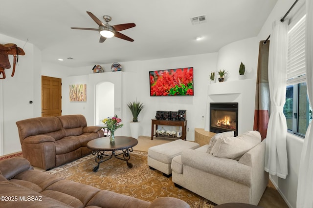 living room with ceiling fan