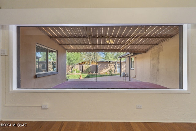 interior space with hardwood / wood-style flooring