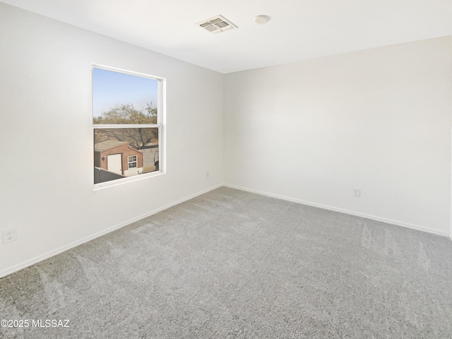 unfurnished room featuring carpet floors