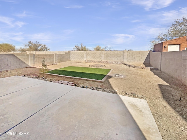 view of yard with a patio area