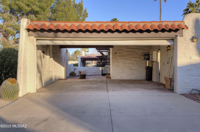 garage featuring a carport