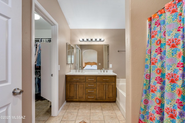 bathroom with vanity and tile patterned flooring