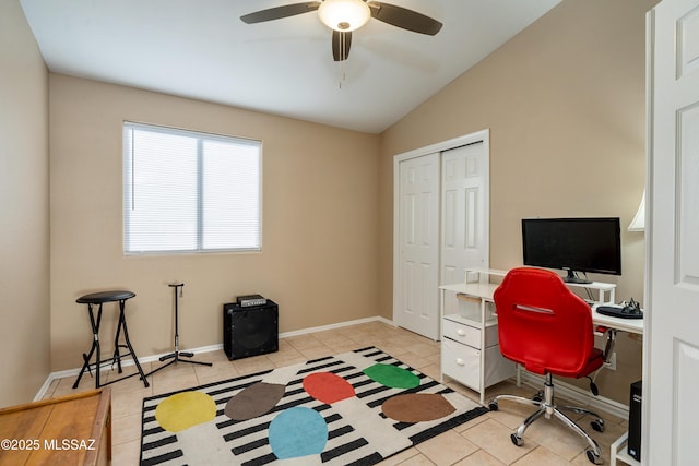 tiled office with vaulted ceiling and ceiling fan