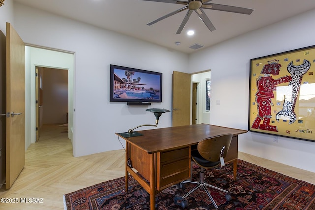 office area featuring ceiling fan and light parquet flooring