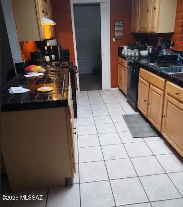 kitchen featuring sink, light tile patterned floors, dishwasher, and light brown cabinets