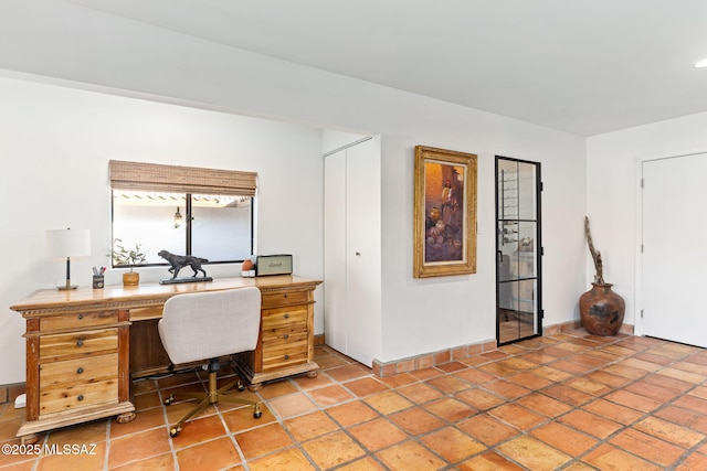 office area featuring tile patterned floors