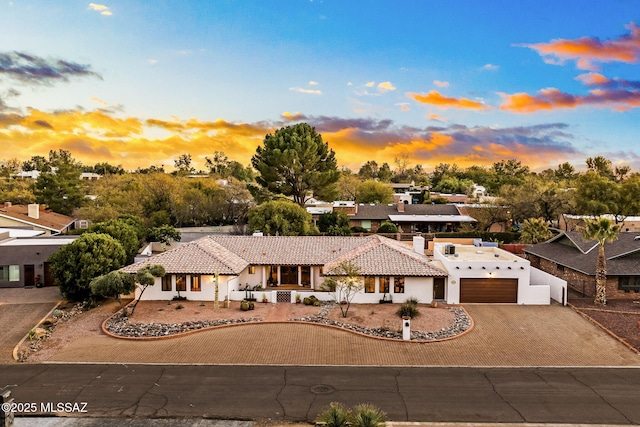 view of front of home with a garage