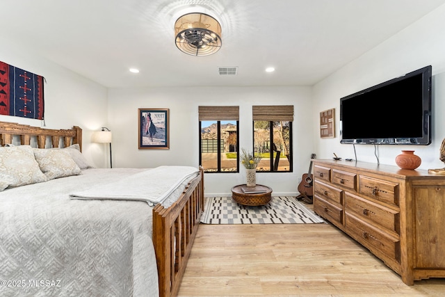 bedroom featuring light hardwood / wood-style flooring