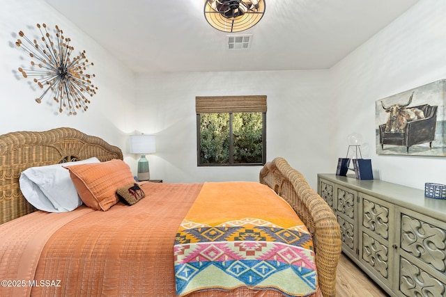 bedroom featuring light wood-type flooring