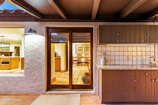 doorway to property with sink