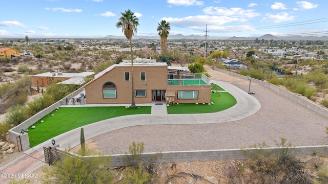 drone / aerial view featuring a residential view and a mountain view