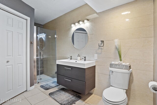 1061 W Roller Coaster Rd, Tucson, AZ 85704 - full bath with tile patterned floors, vanity, tile walls, and a shower stall