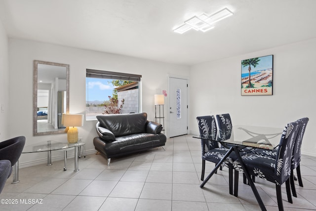1061 W Roller Coaster Rd, Tucson, AZ 85704 - dining space featuring baseboards and light tile patterned flooring