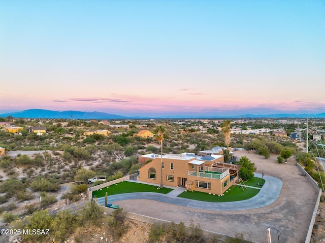 1061 W Roller Coaster Rd, Tucson, AZ 85704 - aerial view at dusk featuring a mountain view